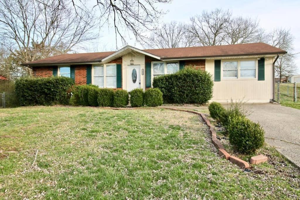 Center of Hendersonville with a fenced backyard